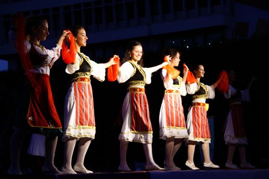 folk dance on stage from balkans in a festival