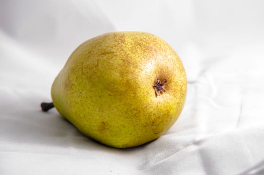 yellow ripe pear isolated on white background