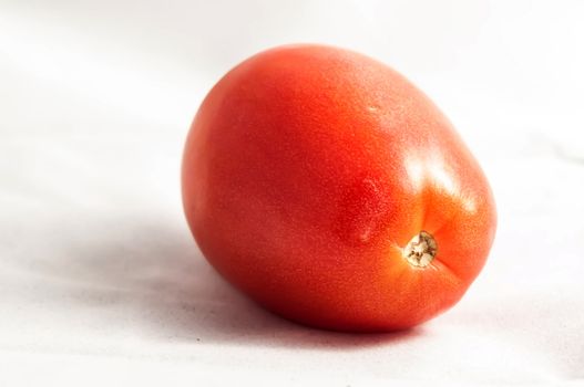 red Tomato isolated on white background.