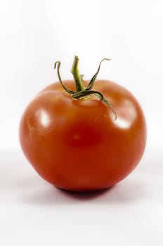 red Tomato isolated on white background.