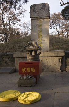 Confucius Grave, Qufu, Shandong Province, China.  Confucius died in 479BC, and he is buried in this grave and graveyard with 100,000 of his descendants.  The Confucius Graveyard is 600 acres on the outskirts of Qufu.
