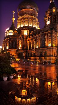 After the Rain Saint Sofia Russian Orthodox Church Reflection Harbin China  Largest Russian Orthodox Church in China.  Built in the early 1900s, now a museum in Harbin.