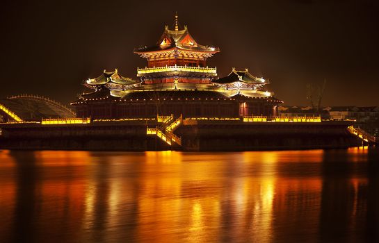 Ancient Temple Night Reflection Bridge Jinming Lake Kaifeng China  Kaifeng was the capital of the Song Dynasty, 1000 to 1100AD.