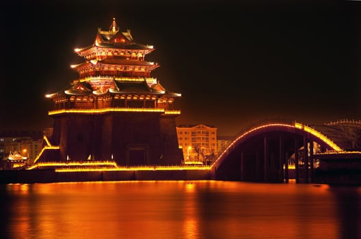 Ancient Temple Night Reflection Bridge Jinming Lake Kaifeng China  Kaifeng was the capital of the Song Dynasty, 1000 to 1100AD.