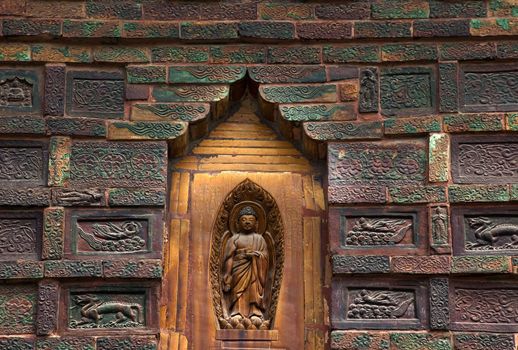 Ancient Buddha Bricks Dancers Angels Flute Player Details Iron Pagoda Buddhist Monument Kaifeng China Built in 1069 by the Kaibao Buddhist Monstary.  Best example of glazed brick pagoda in China