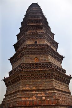 Ancient Iron Pagoda Buddhist Monument Kaifeng China Built in 1069 by the Kaibao Buddhist Monstary.  Best example of glazed brick pagoda in China