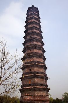 Ancient Iron Pagoda Buddhist Monument Kaifeng China Built in 1069 by the Kaibao Buddhist Monstary.  Bext example of glazed brick pagoda in China