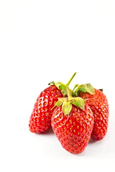 strawberries placed on a white background