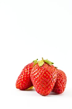 strawberries placed on a white background