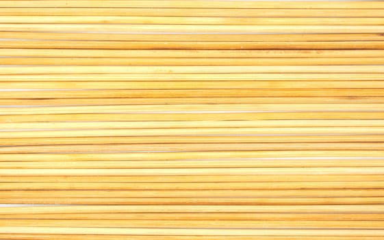 Long thin wooden sticks as a natural background