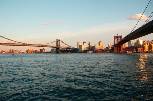 Brooklyn and Manhattan bridges across East River in New York City.