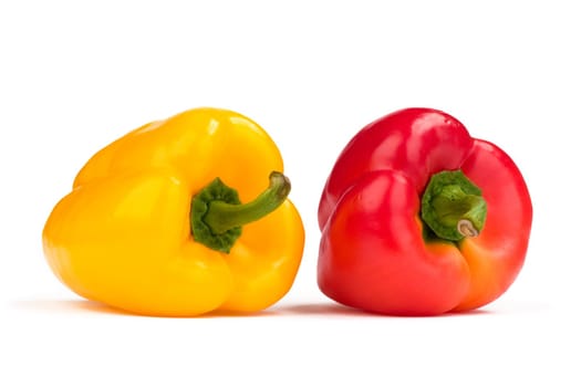 Red and yellow pepper isolated on white background
