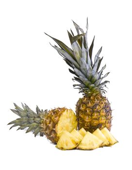 Ripe fruits pineapple witch slices isolated on white