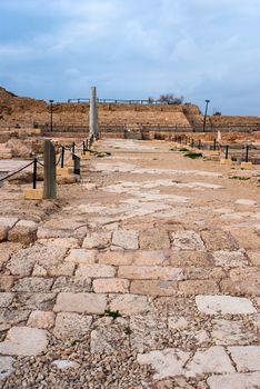 Ruins of the ancient Romanian harbor, Caesarea, Israel .