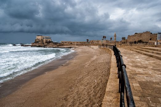 Ruins of harbor at Caesarea - ancient roman port in Israel