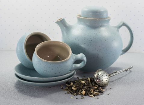 teacups tea and teapot with teaegg