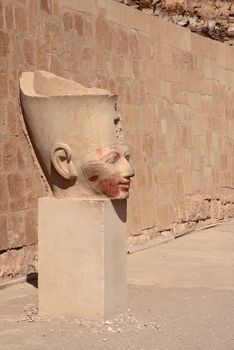 The ancient stone pharaoh's head in Egyptian temple