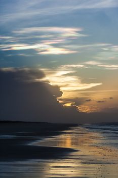 An image of a multi color cloud seen at 80 mile beach Australia