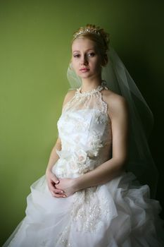 Beautiful bride in dress with flowers