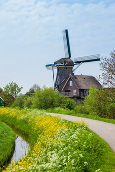 Windmill on the outskirts of Amsterdam. Holland the Netherlands. Vertical view