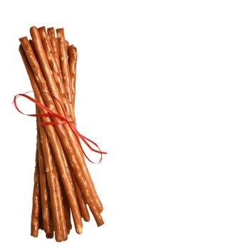 Crispy bread straw on white background