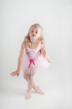 Studio shot of dancing ballet dancer girl