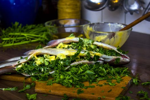 Two raw trouts on the kitchen table, ready to cook