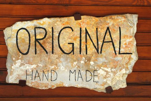 Original hand made sign on stone