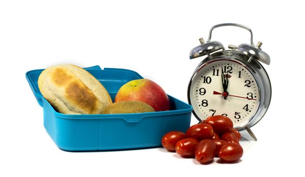 twelve o clock lunchtime with bread and fruit