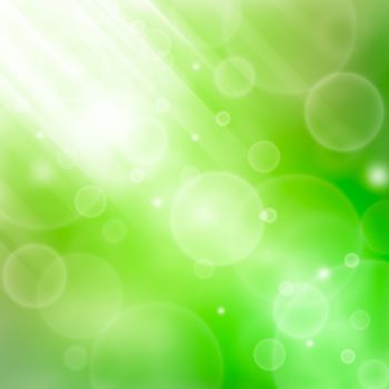 Green abstract spring background with bokeh and sunburst