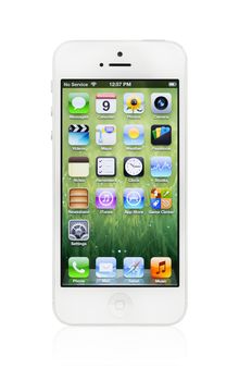 Kiev, Ukraine - January 11, 2013: The new white Apple iPhone 5, sixth generation version of the iPhone is slimmer and lighter model with new high-resolution, 4-inch screen display.