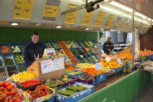 two mam with fruit stall on the market in Holland