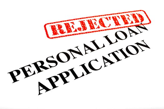 A close-up of a REJECTED Personal Loan Application document.