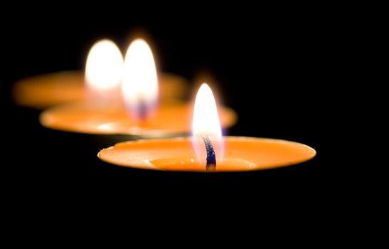 Three small candles or tea lights.