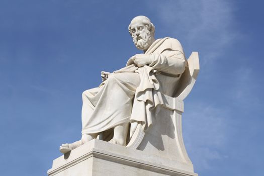 Nineteenth century neoclassical statue of ancient Greek philosopher Plato outside the Academy of Arts of Athens in Greece.