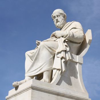 Nineteenth century neoclassical statue of ancient Greek philosopher Plato outside the Academy of Arts of Athens in Greece.