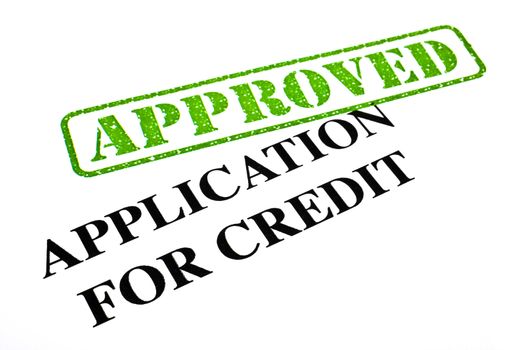 A close-up of an APPROVED Credit Application document.