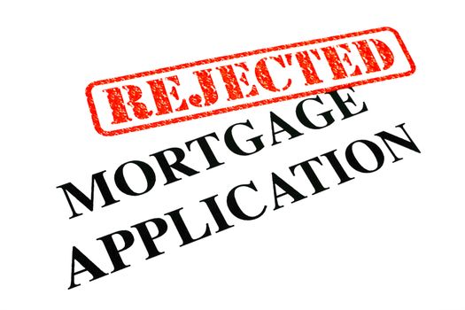 A close-up of a REJECTED Mortgage Application document.