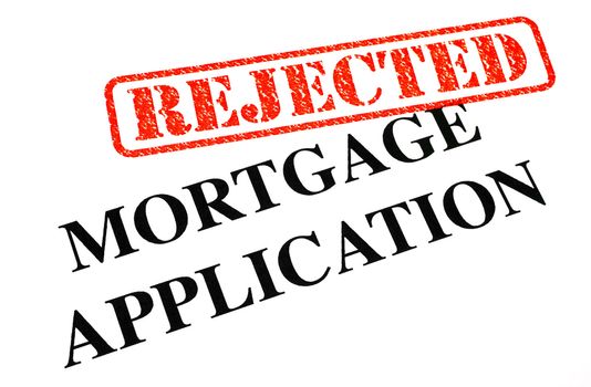 A close-up of a REJECTED Mortgage Application document.