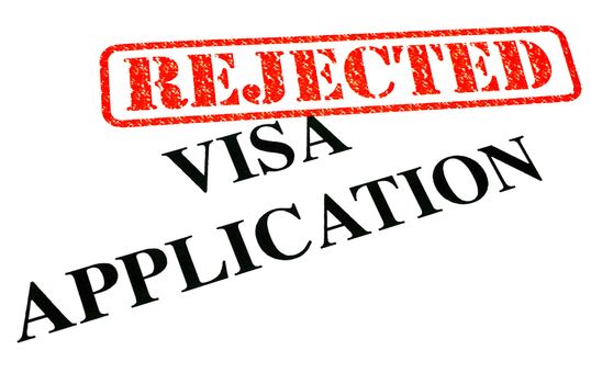 A close-up of a REJECTED Visa Application document.