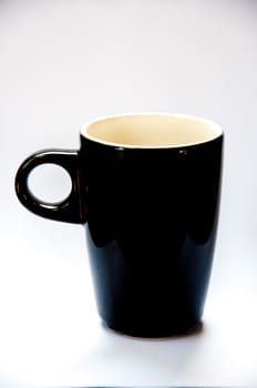 black cup of coffee on white background