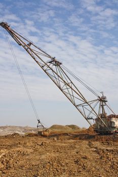 The industrial mechanism - a mountain dredge