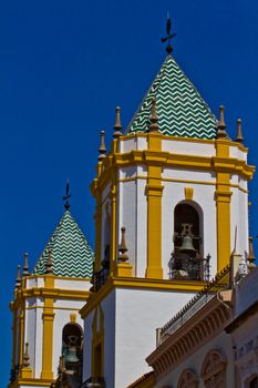 Blue sky over the church bells of ronda. Spain.