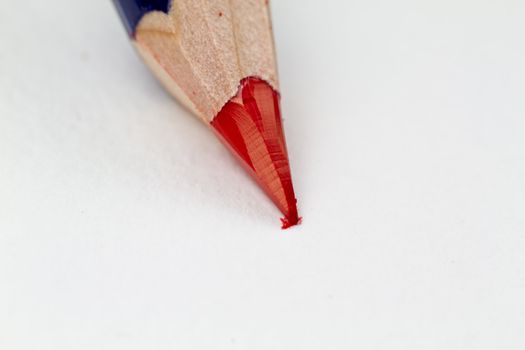 Close up of a Poppy red pencil in action.