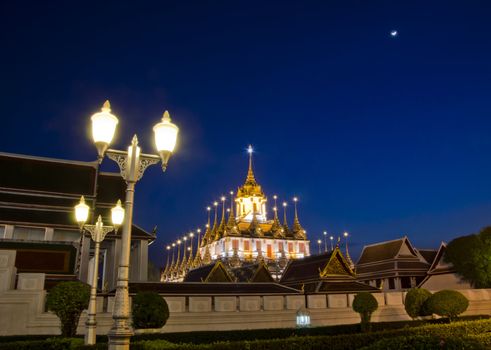 Iron temple Loha Prasat in Wat Ratchanatdaram Worawihan in night, Bangkok, Thailand 