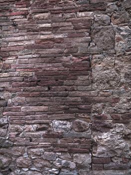 High definition photograph of a ancient worn wall in Italy shot in medium format Hasselblad and Phase One digital for maximum quality. Background image of a Tuscan Wall