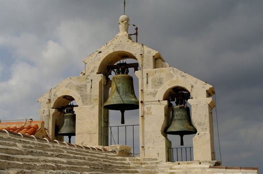 Thre old bells on "fortress" church in Vrboska Croatia