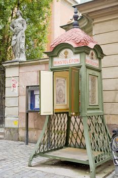 Vintage urban phone in the old city of Stocholm, Sweden. Taken on July 2011.