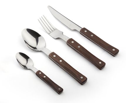 Set of metal tableware with wooden handle on the white background