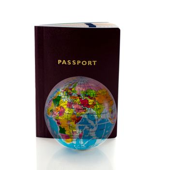 passport to travel around the world with world globe on foreground